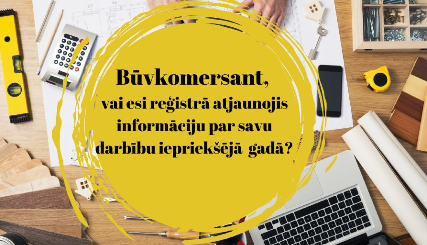 Foto ar būvnieka darba galdu un informatīvu aicinājumu iesniegt ikgadējo informāciju